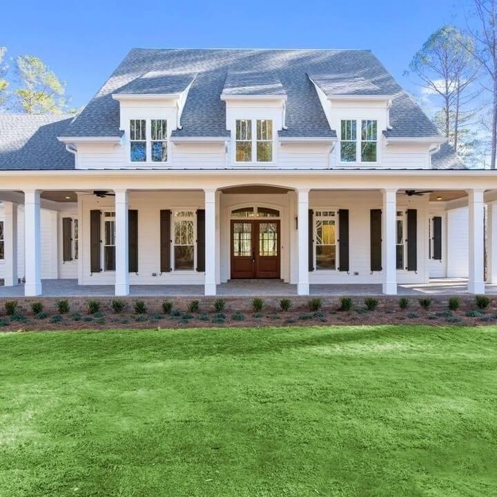 Double Front Doors With Transom Window Frame the Entry