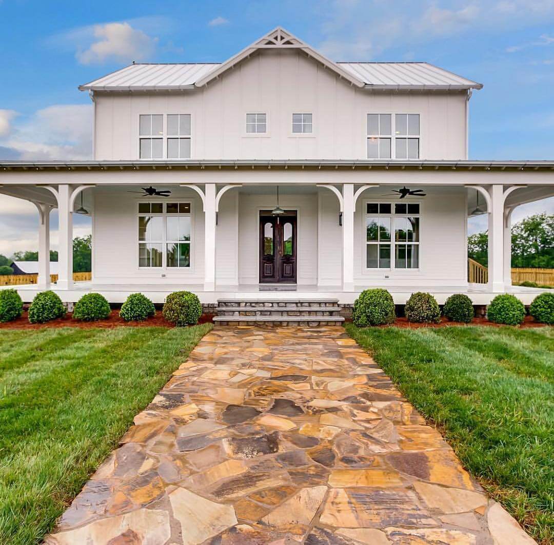 Stone Pathway Leads to a Welcoming Double Door Entry