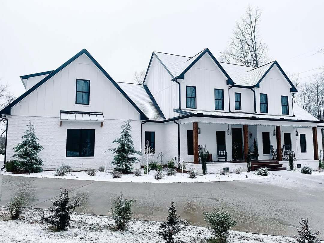 Black Accent Trim Defines White Farmhouse Gables