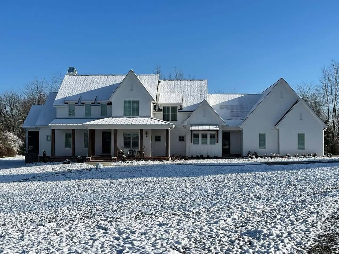 Gable Rooflines Create Architectural Interest on White Farmhouse