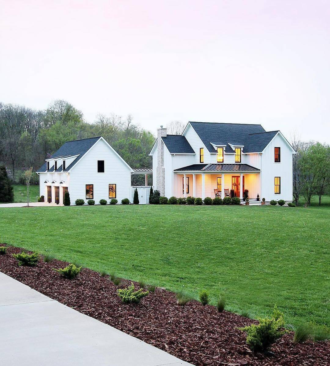 Carriage House Style Garage Doors Complement White Exterior