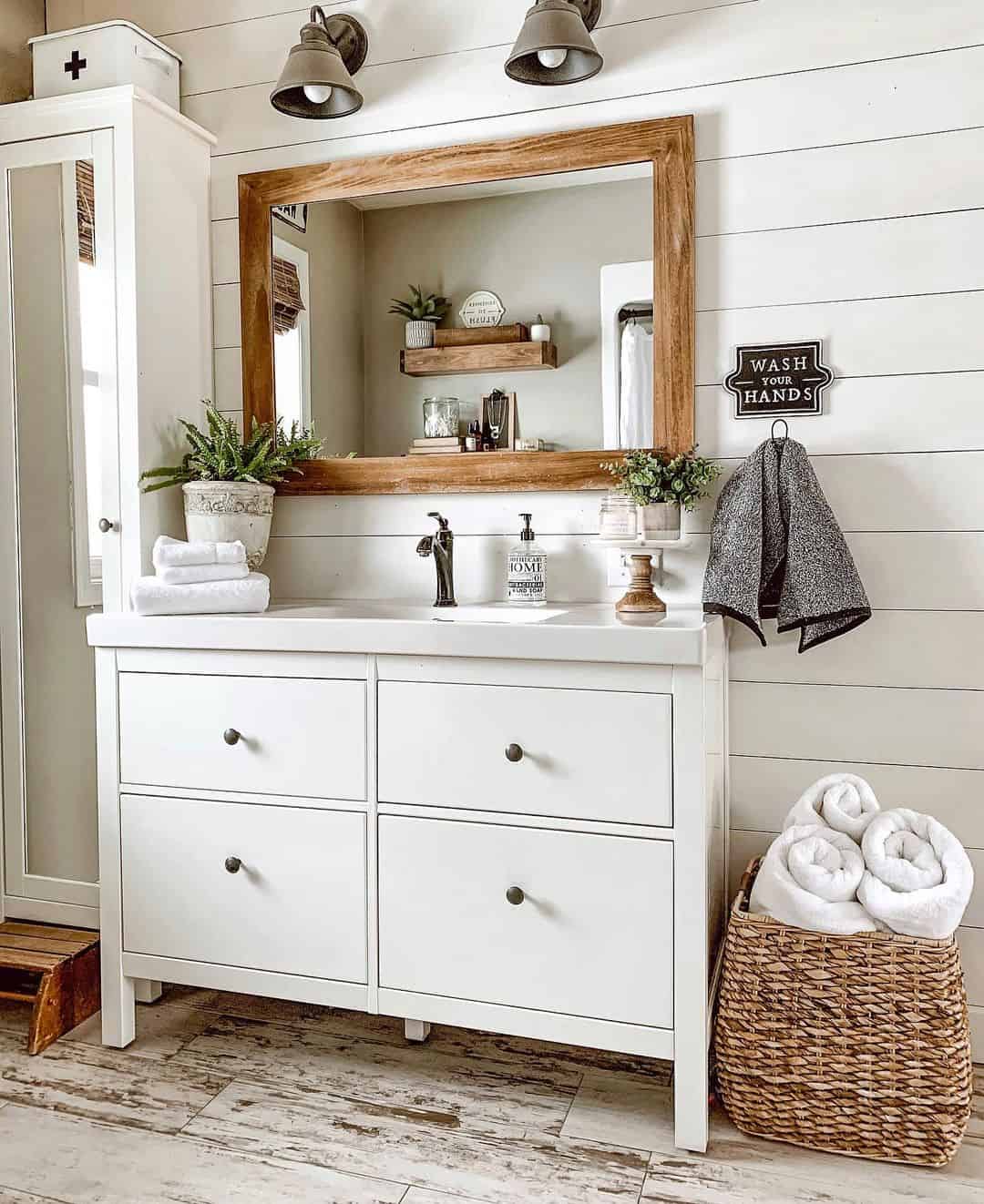 Woven Basket Stows Rolled Towels Beside the Vanity