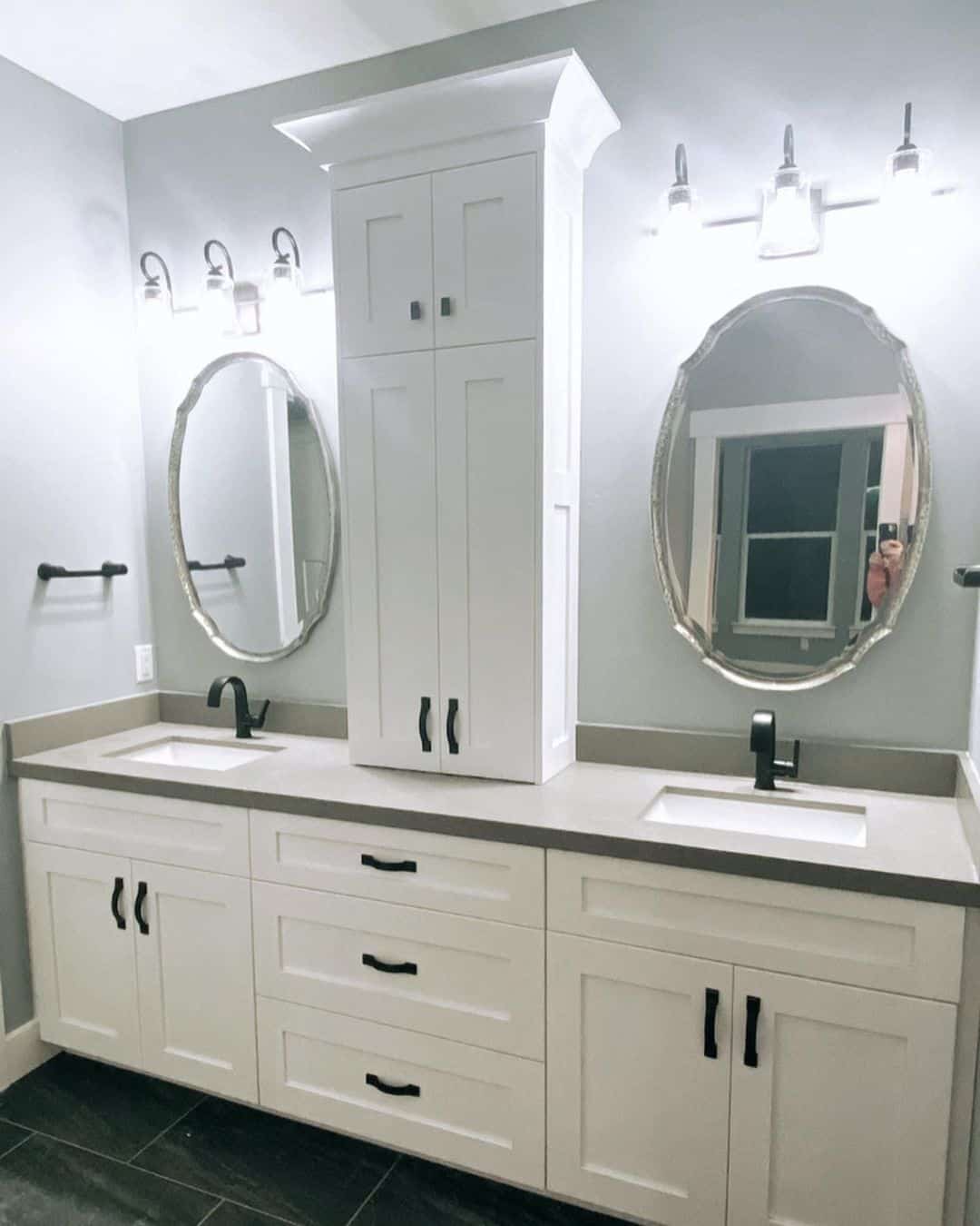 Tall White Cabinet Adds Vertical Storage Above the Counter