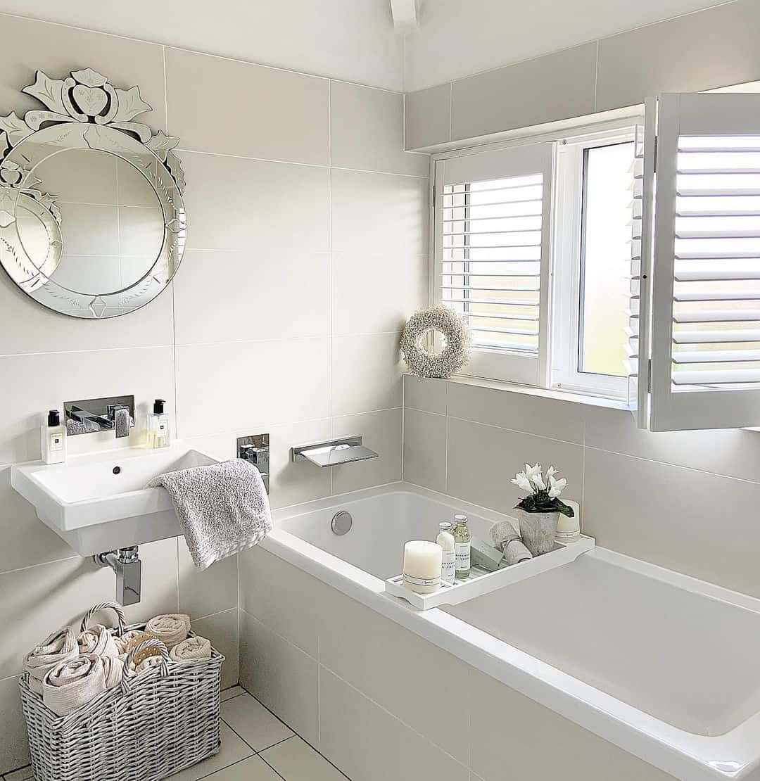 White Bathtub Caddy Holds Bath Essentials and Small Plant