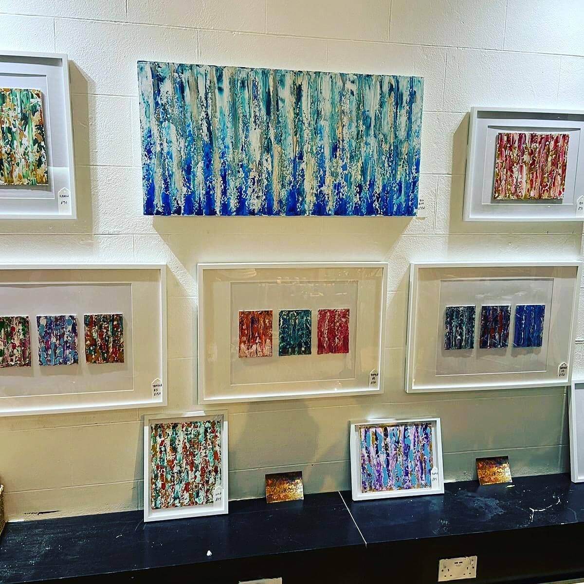 Grouped Triptych Art Adds Color Blocks to a White Wall