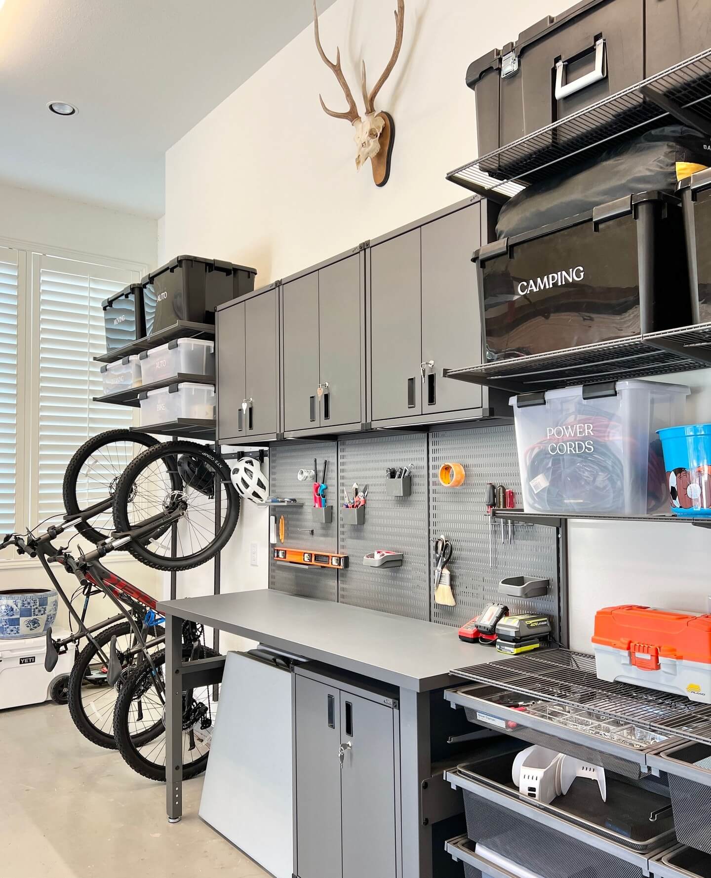 Pegboard Wall Organizes Tools and Supplies Near Workbench