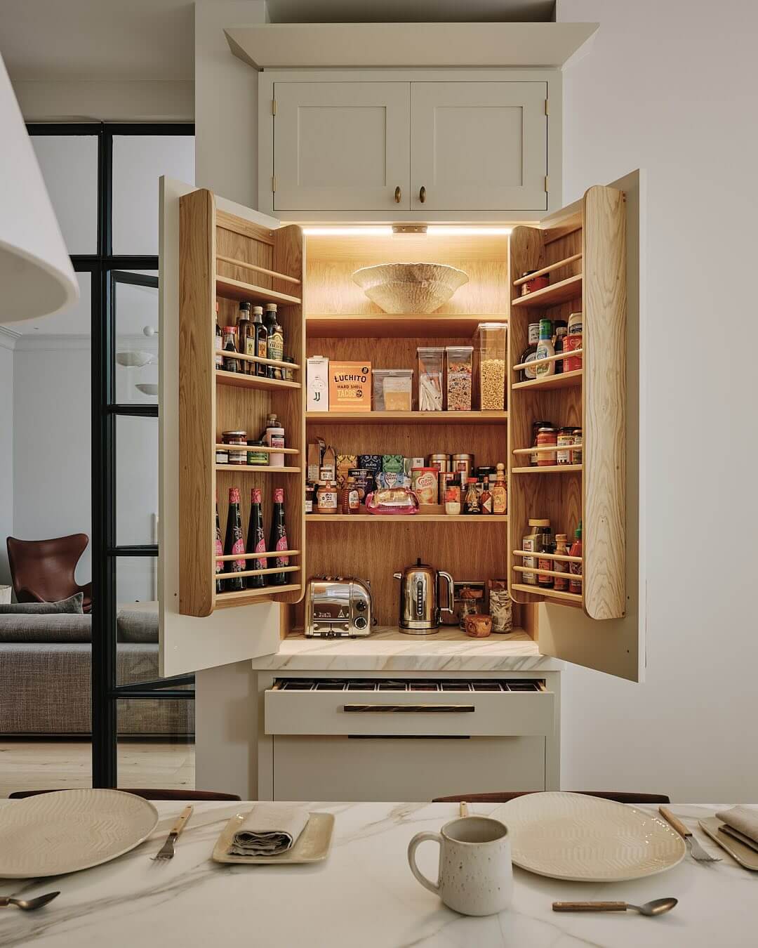 Keep Jars Accessible with Tiered Wooden Shelves on Doors