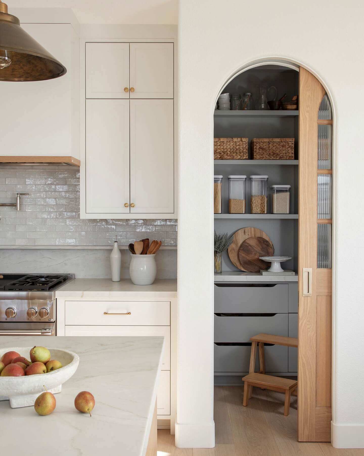 Conceal Clutter with an Arched Pantry Door