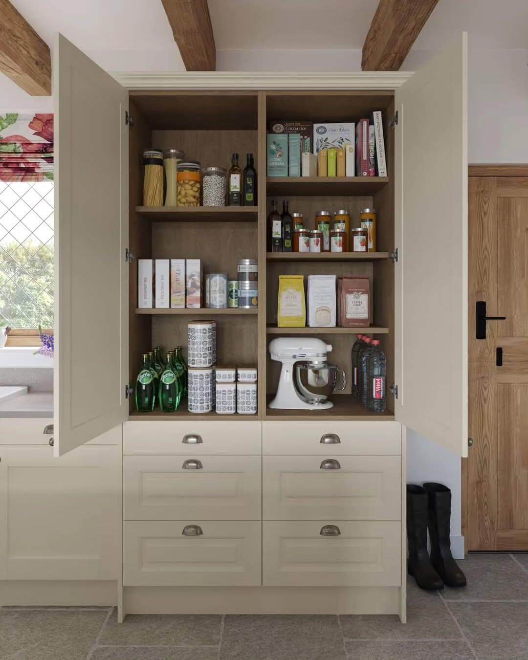 Tall Pantry Doors Conceal Clutter Behind Cream Cabinetry
