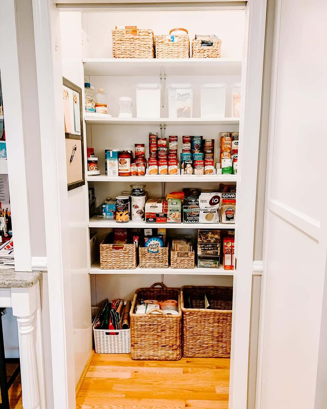 Woven Baskets and White Bin Corral Items on Floor Level