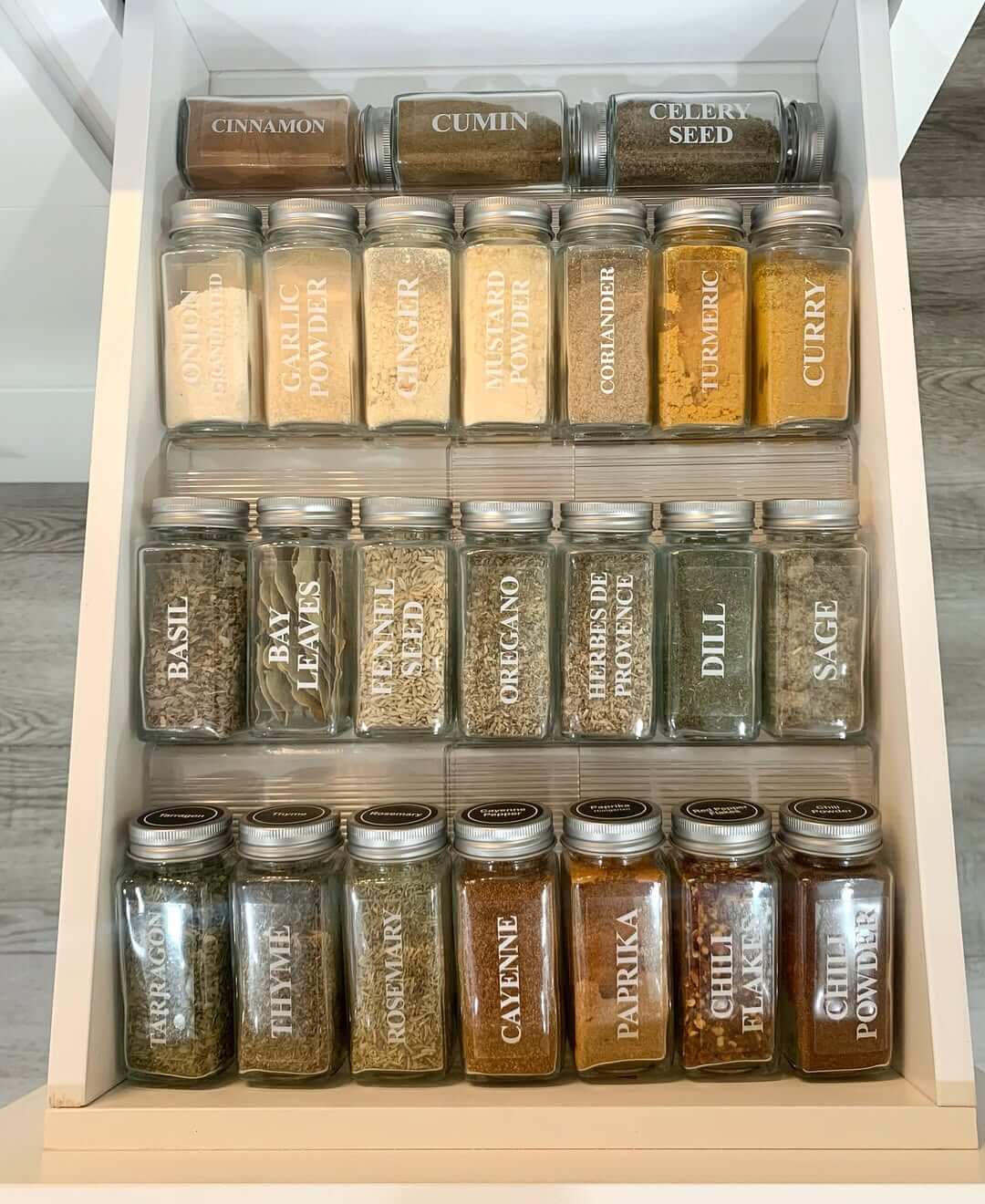 Uniform Spice Jars Keep Drawer Contents Neatly Aligned