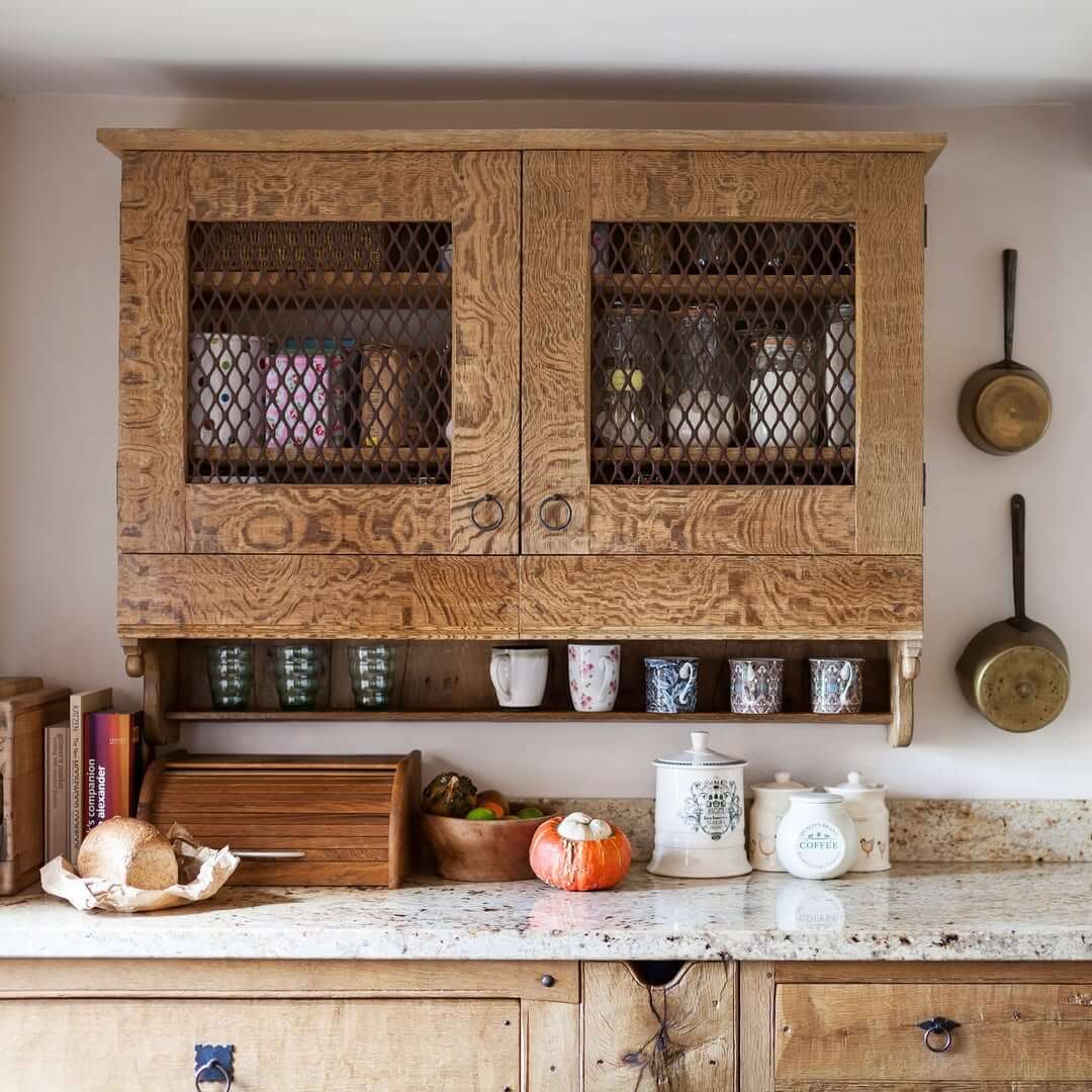 Wire Mesh Cabinet Doors Keep Items Visible While Hiding Clutter