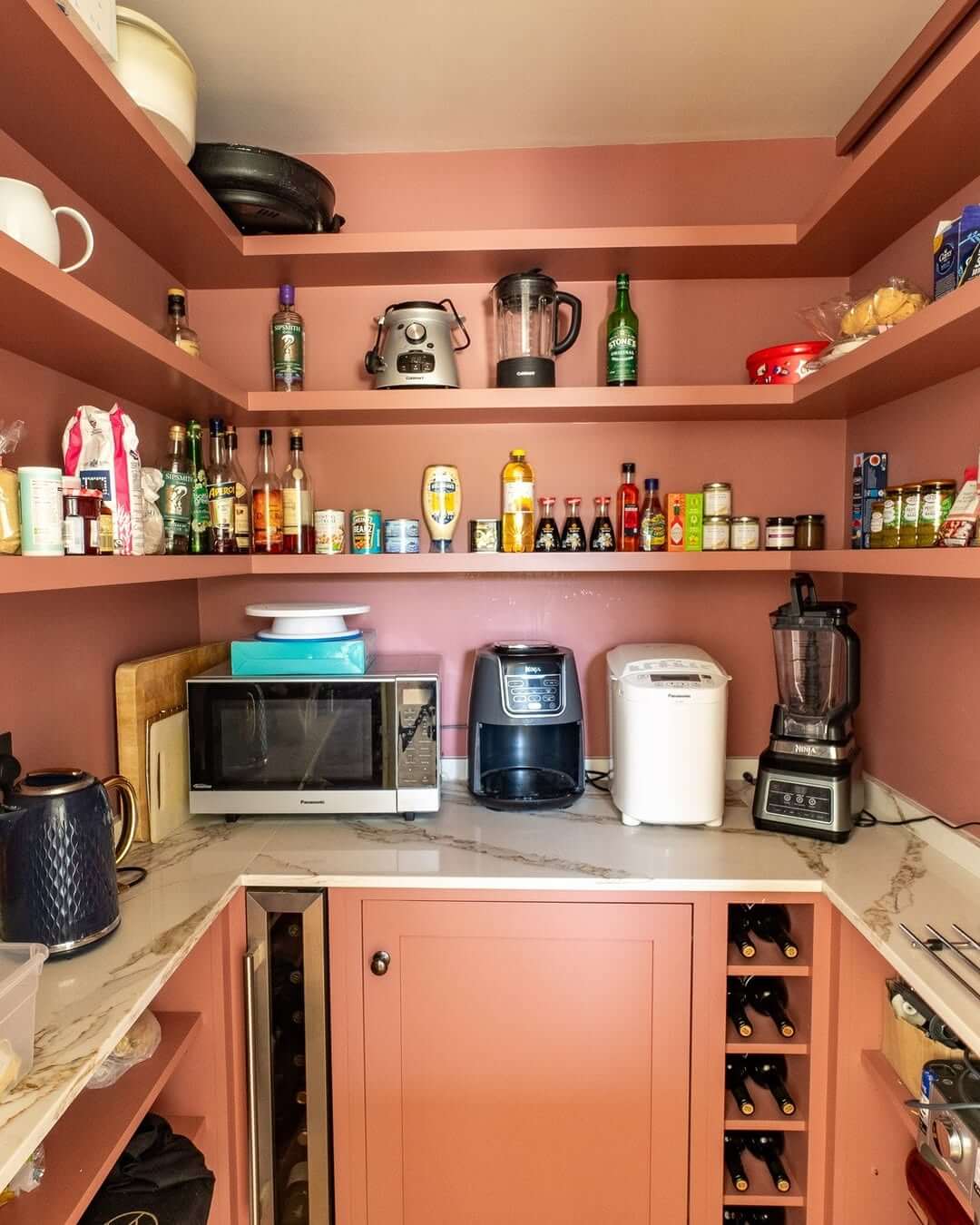 Deep Rose Pantry Shelves Hold Appliances and Pantry Staples