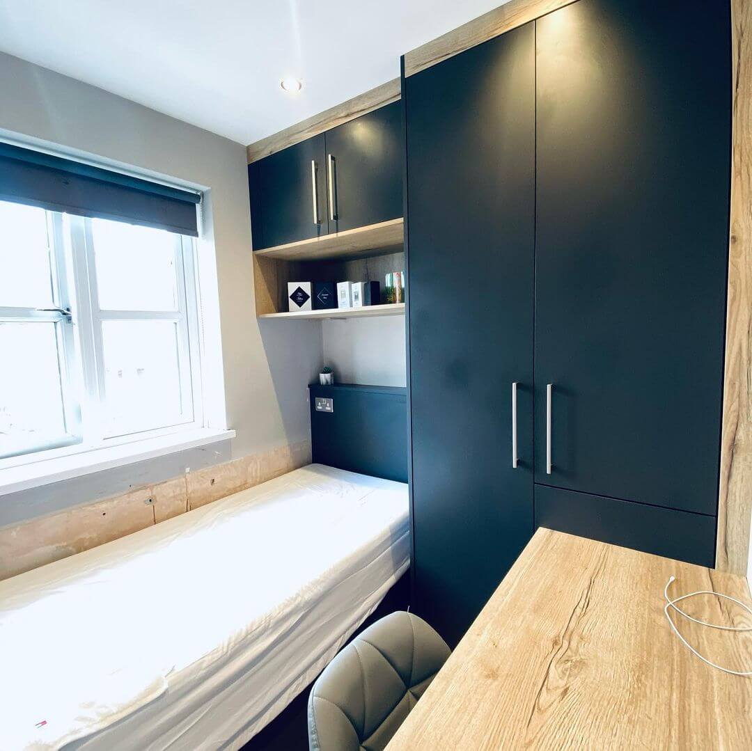 Maximize Storage With a Dark Built-In Wardrobe and Shelving Unit