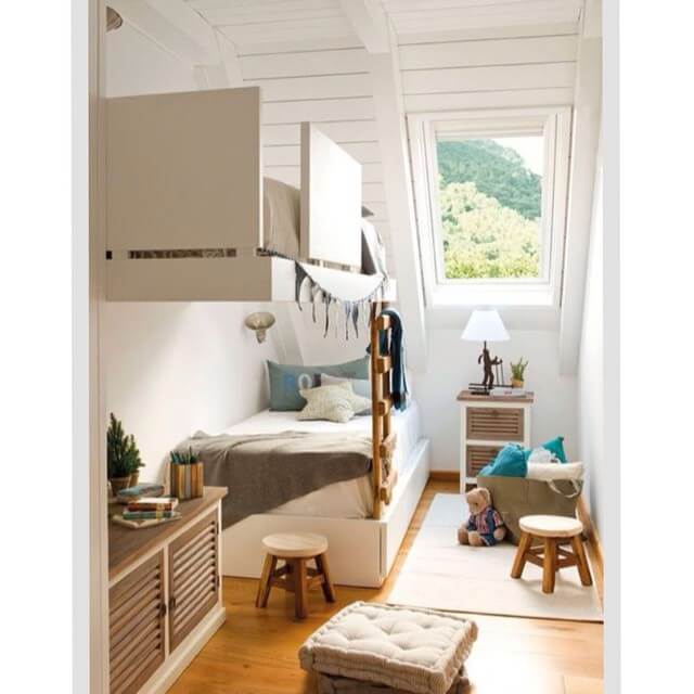 Wall-mounted cabinet creates a lofted play or storage zone