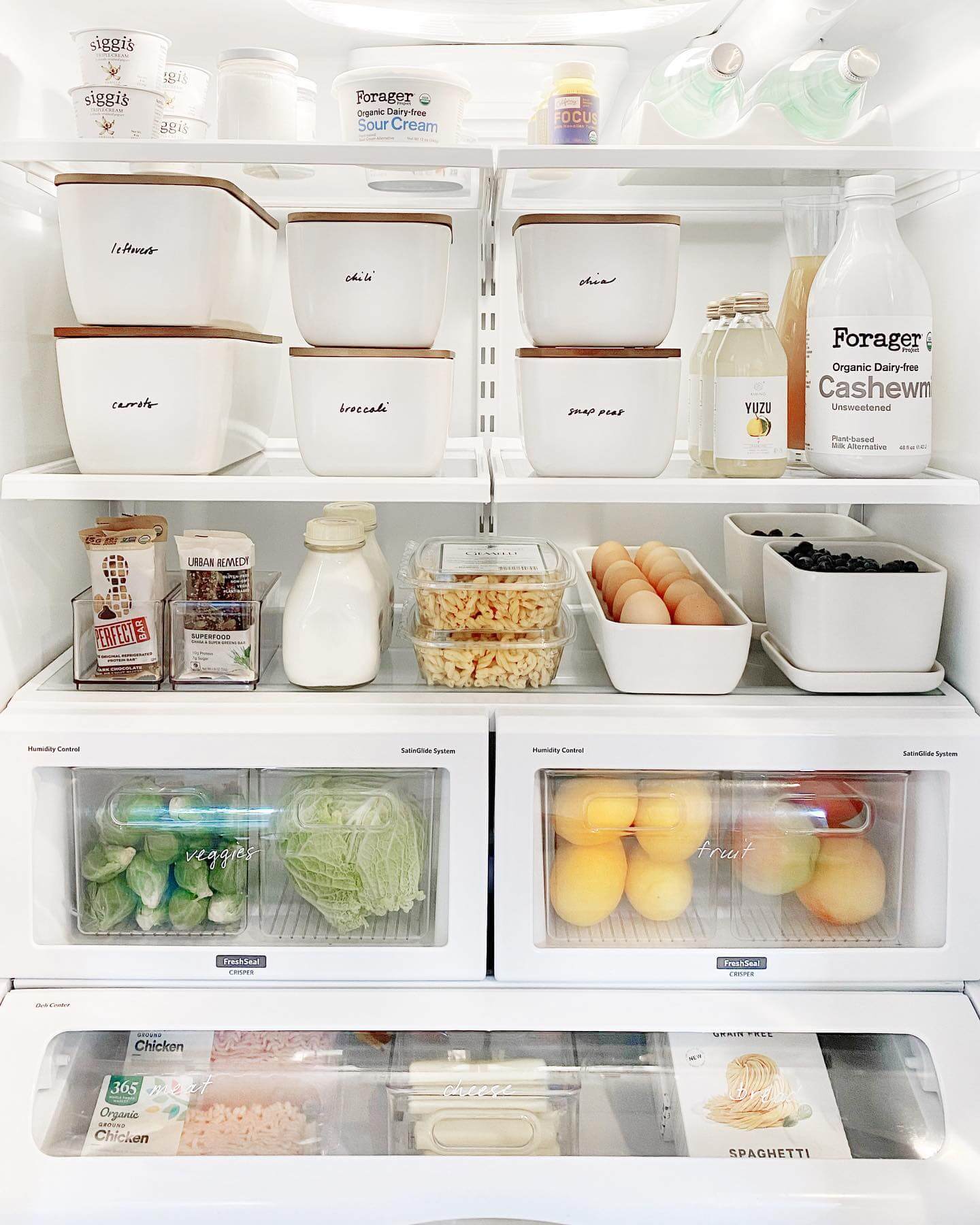 Label Contents Clearly in White Bins with Wood Lids