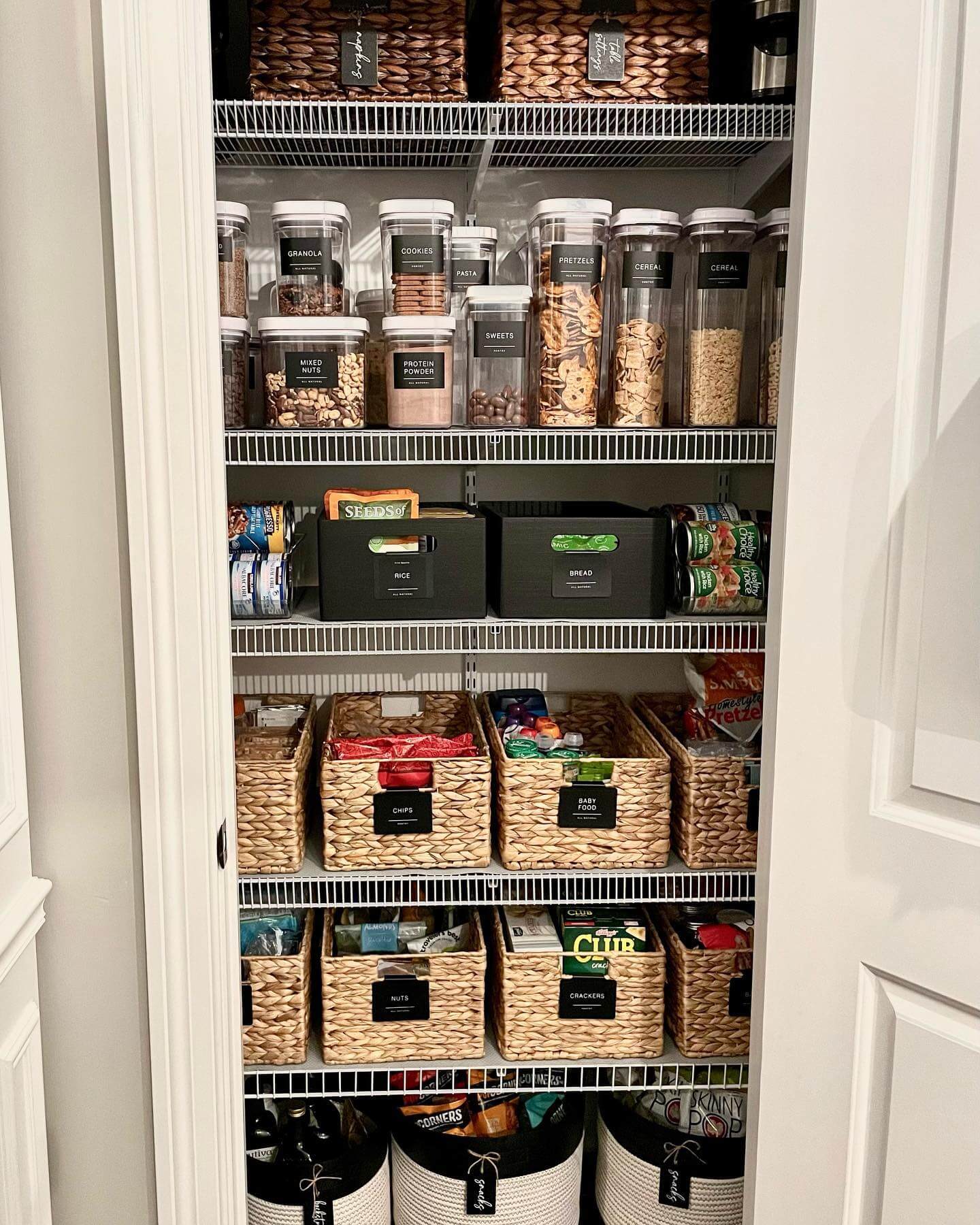 Black fabric bins create defined zones on shelves