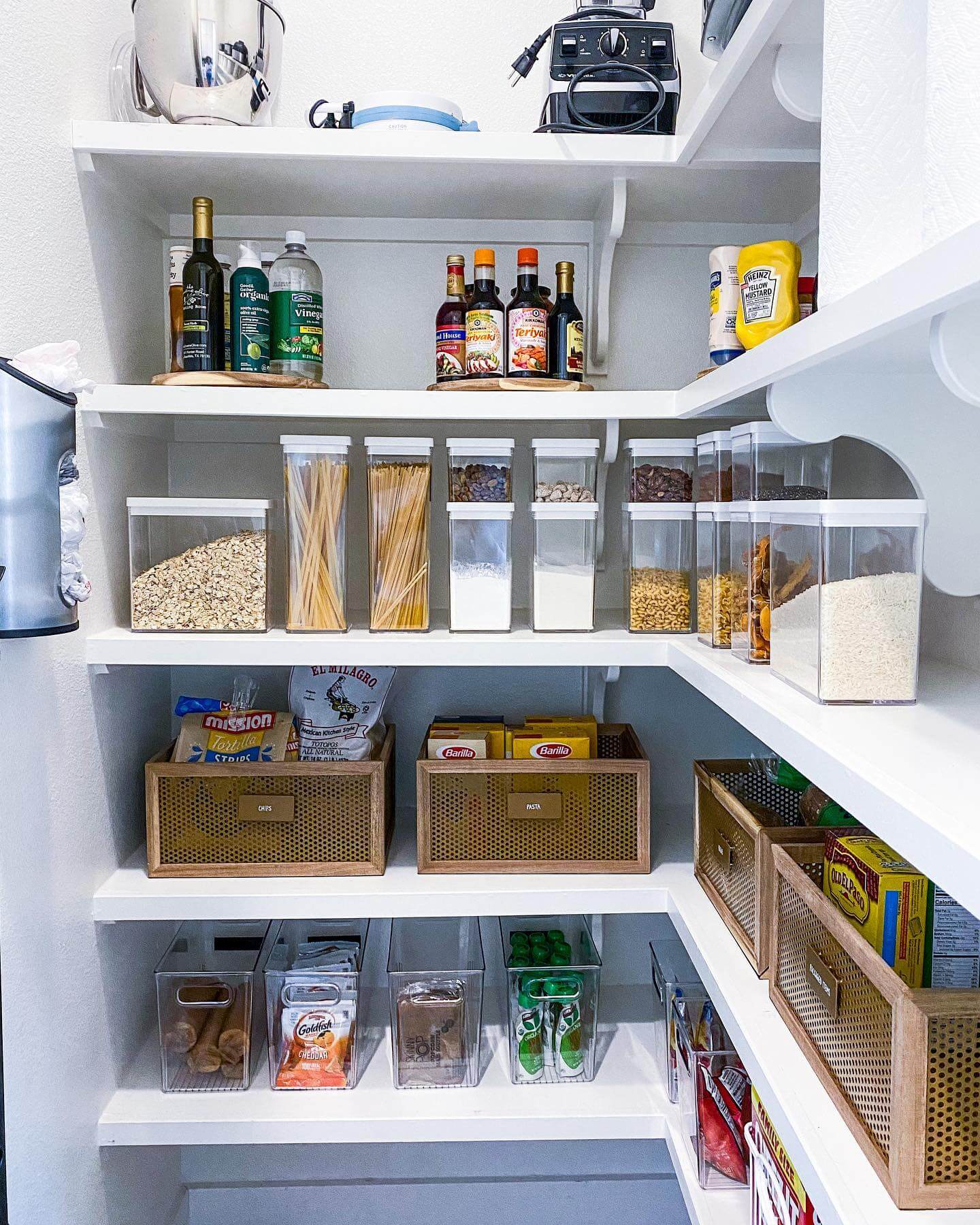 Mesh-fronted wood bins organize boxed goods and bags