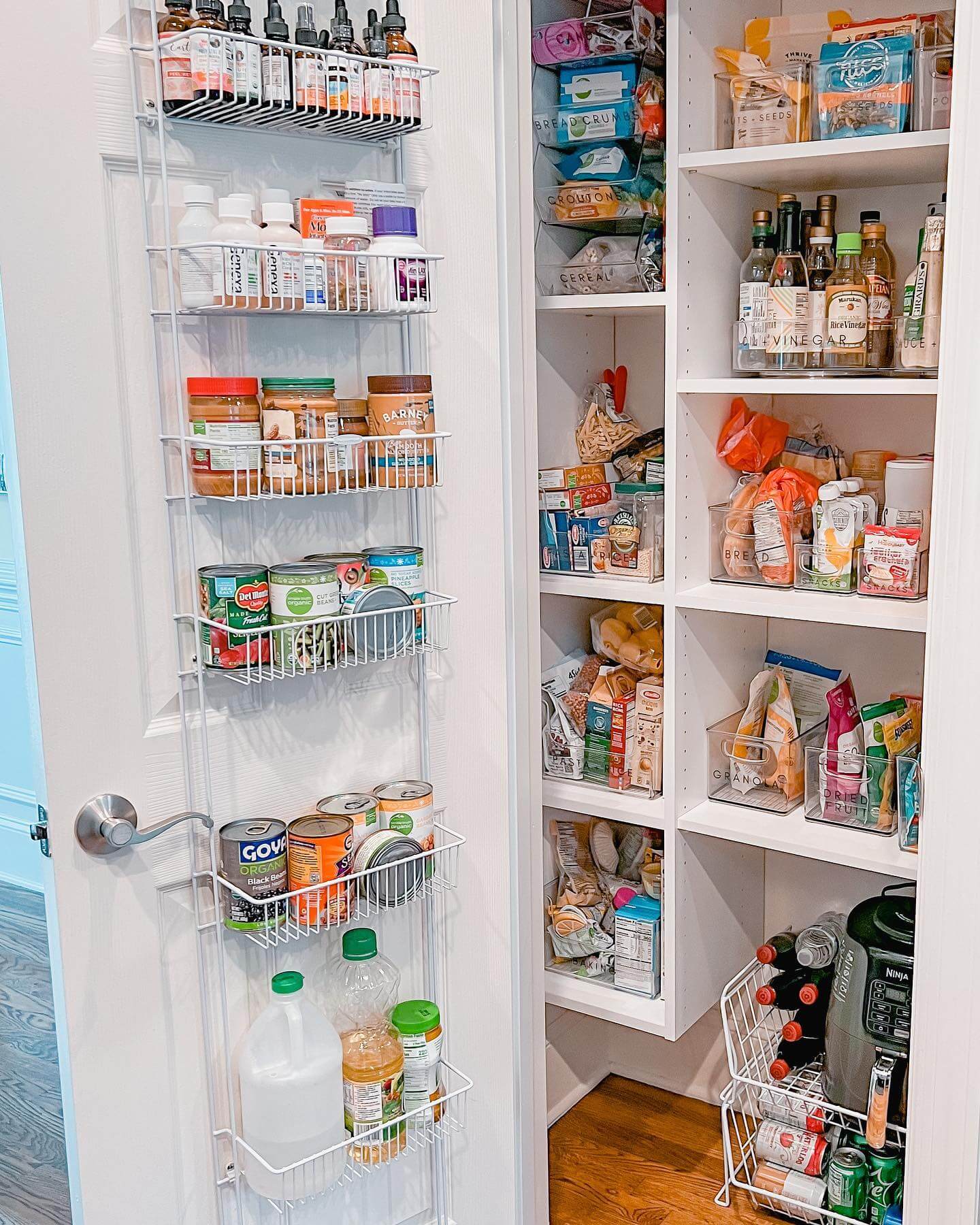 Door-mounted wire baskets add vertical storage for jars and cans