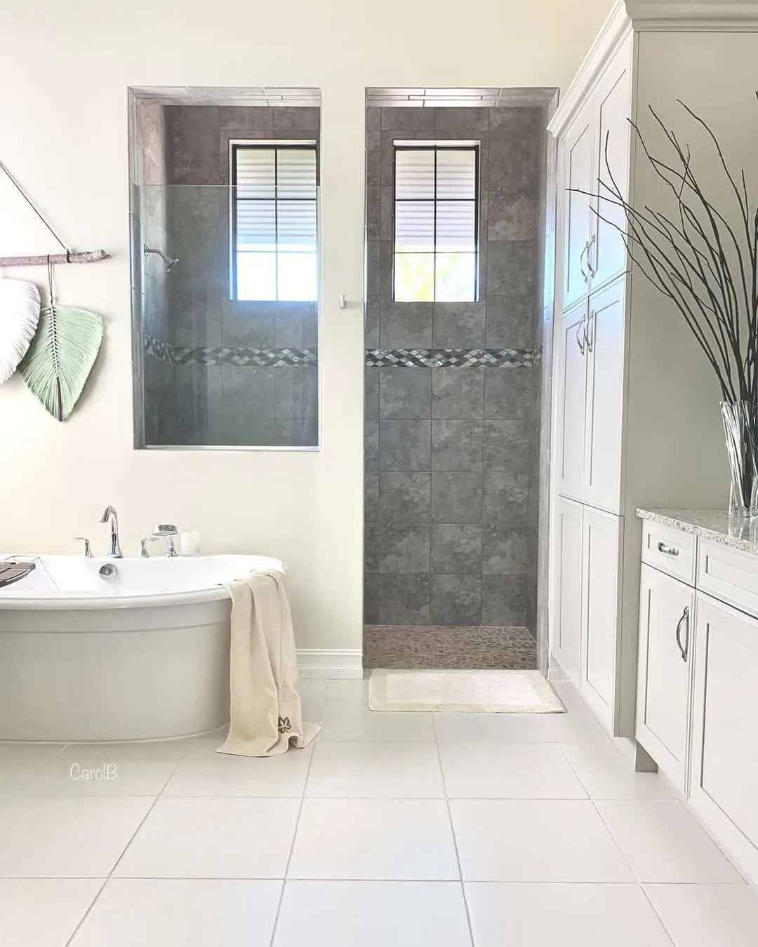 Dark Gray Square Tiles Create a Moody Shower Enclosure
