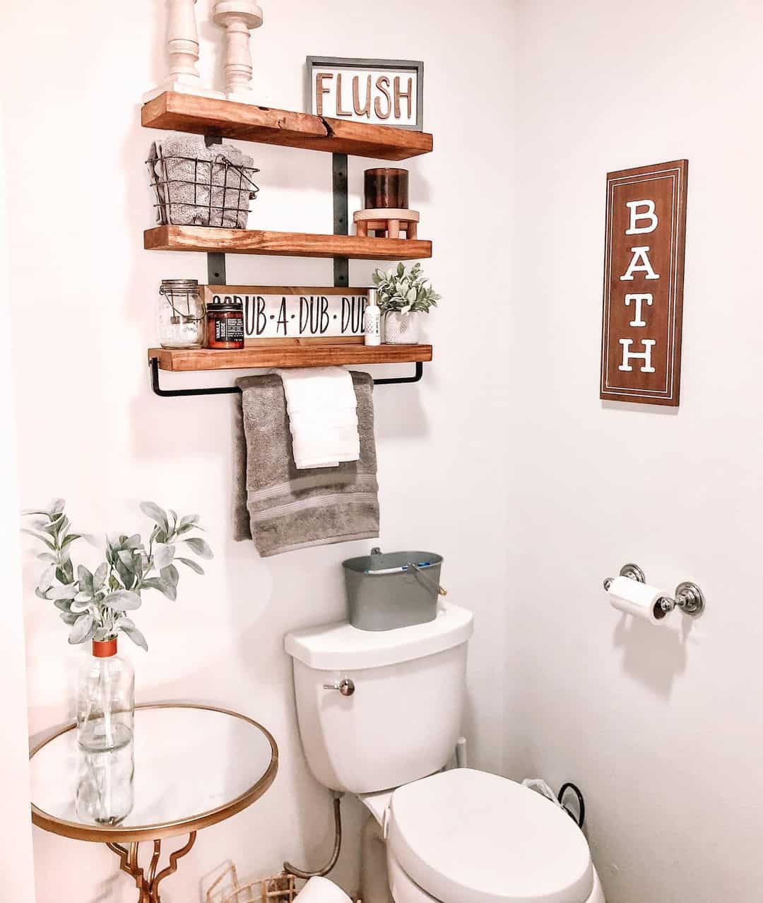 Wooden Shelves with Towel Bar and Rustic Signage