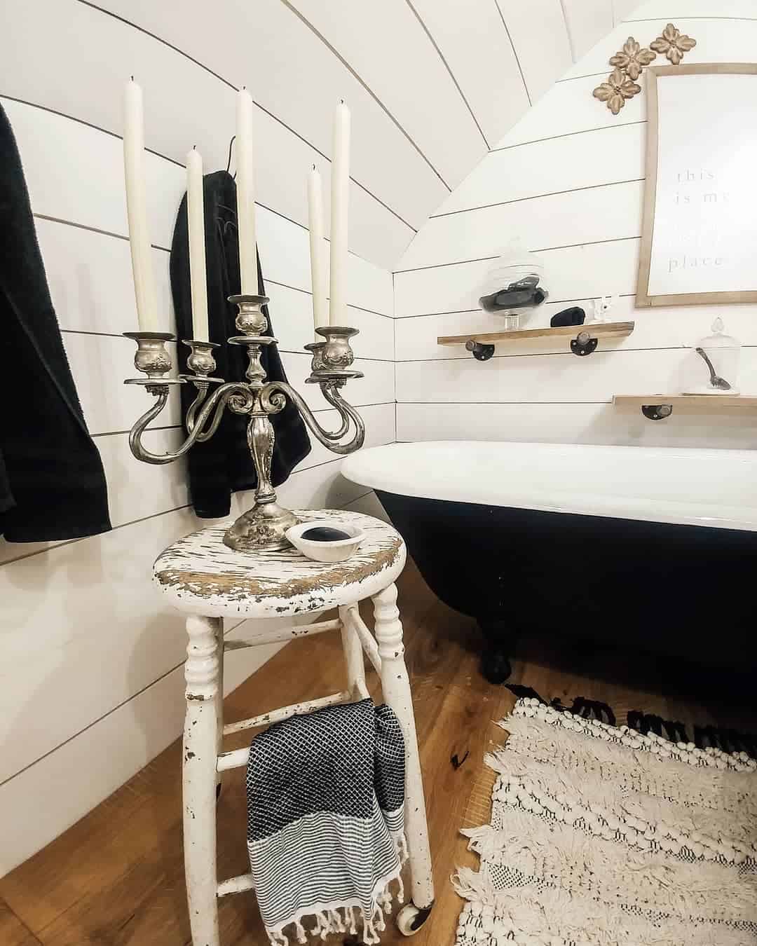 Antique Candelabra Adds Dramatic Ambiance to Bathroom Shelf