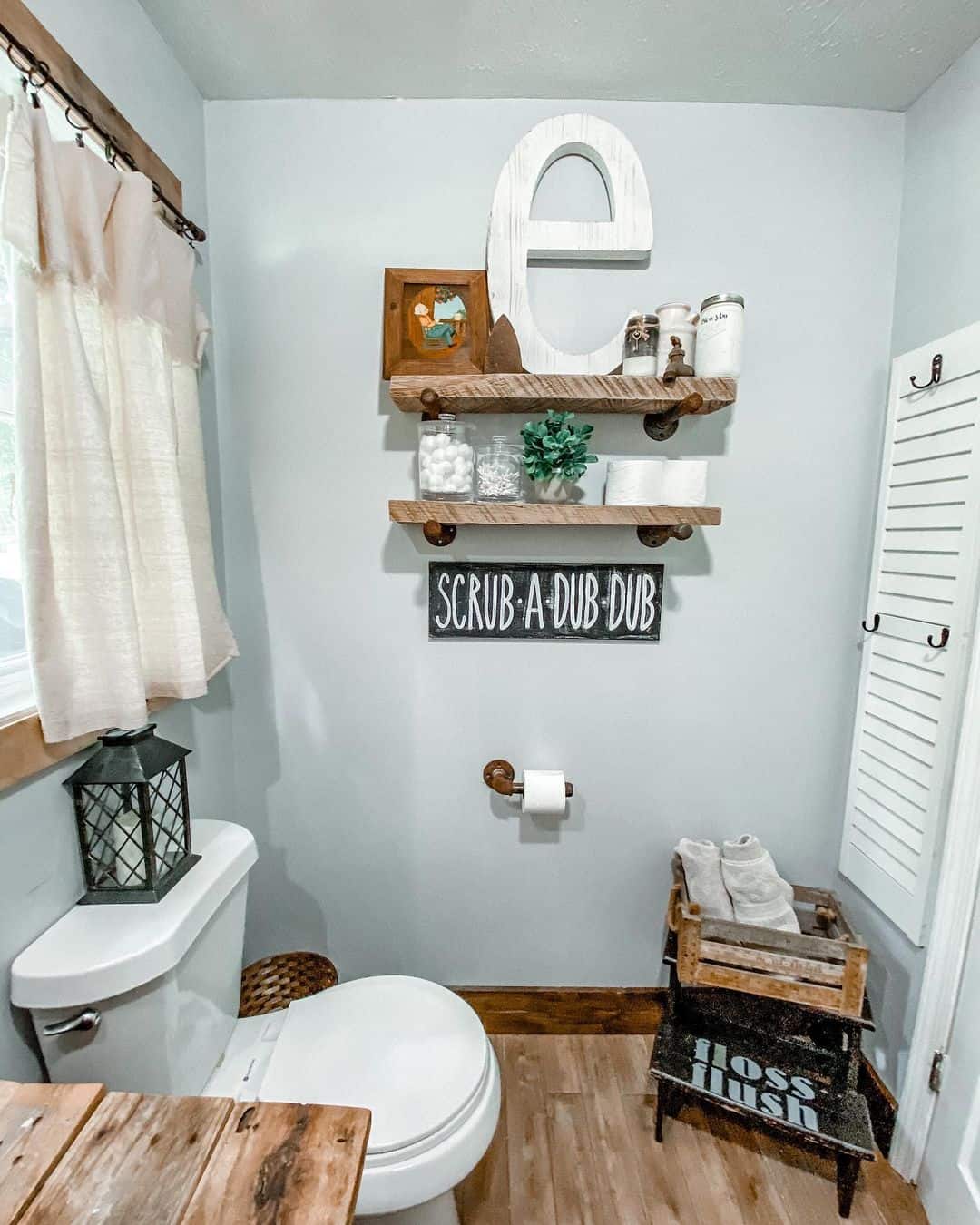 Rustic Wooden Shelves with Industrial Pipe Brackets