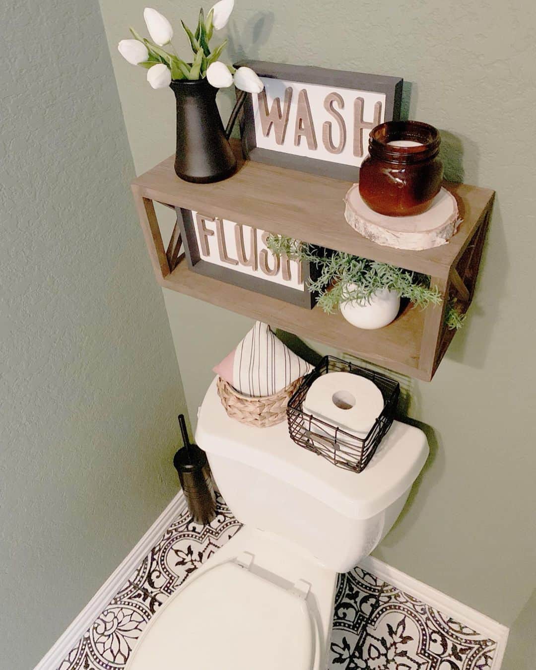 Wooden Shelf with Dual Word Art Displays Above Toilet