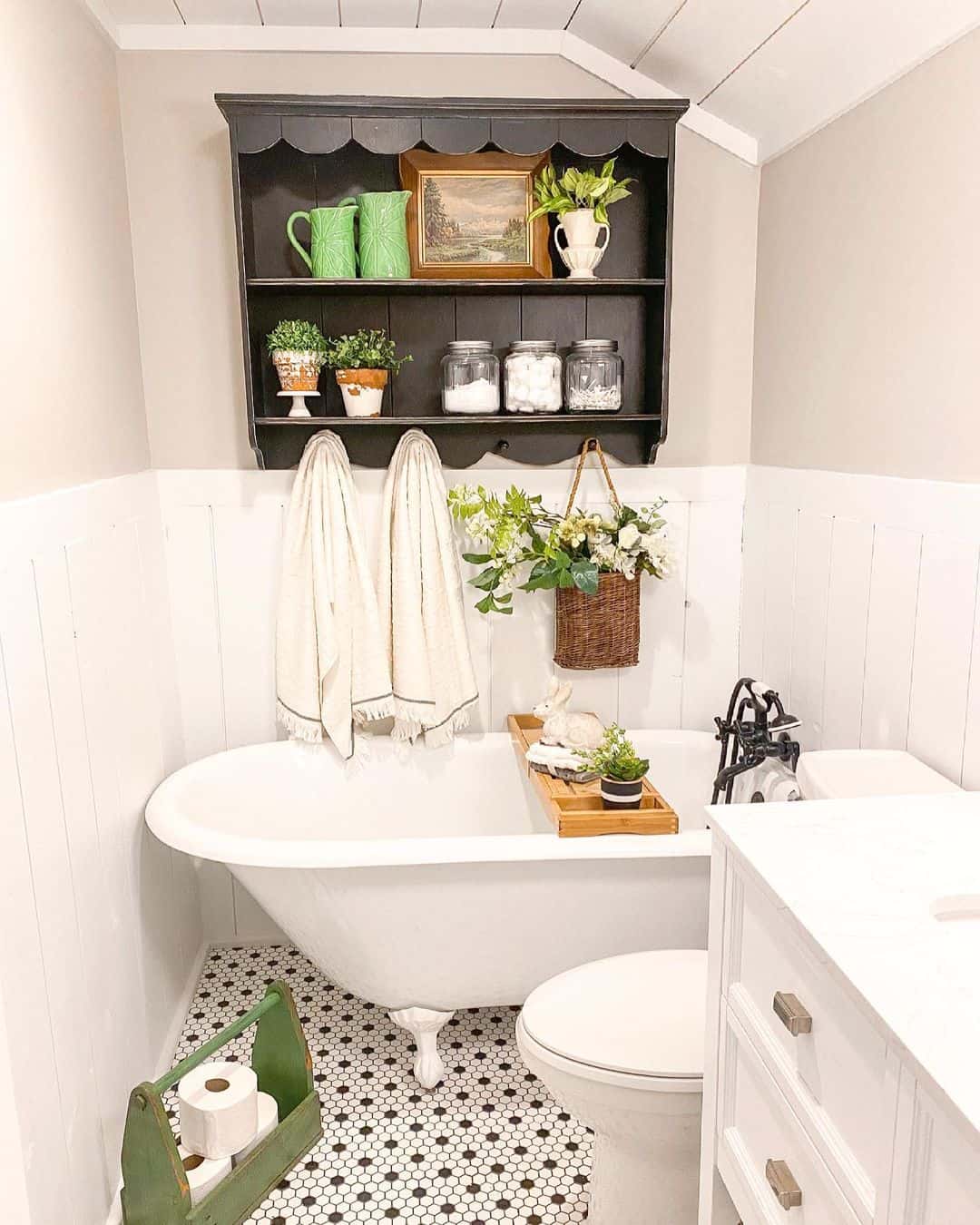 Scalloped Black Shelf Unit Holds Bathroom Decor and Essentials