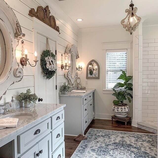 Ornate Wall Sconces Frame Arched Mirror Accents