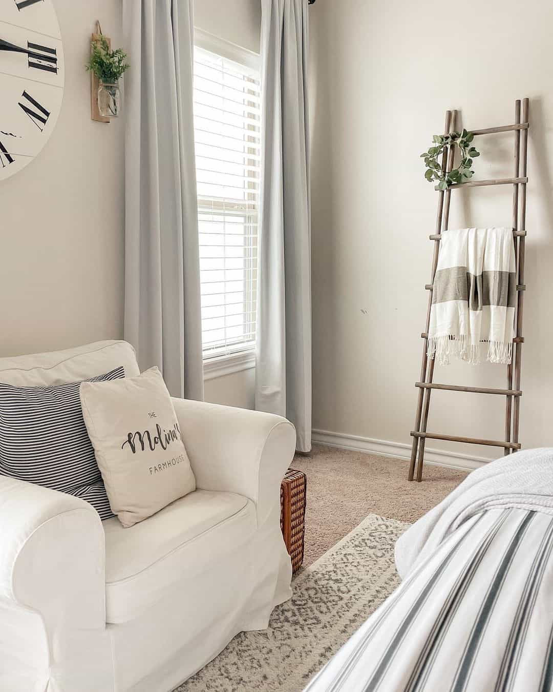 Lean a Wooden Ladder to Display a Throw and Greenery