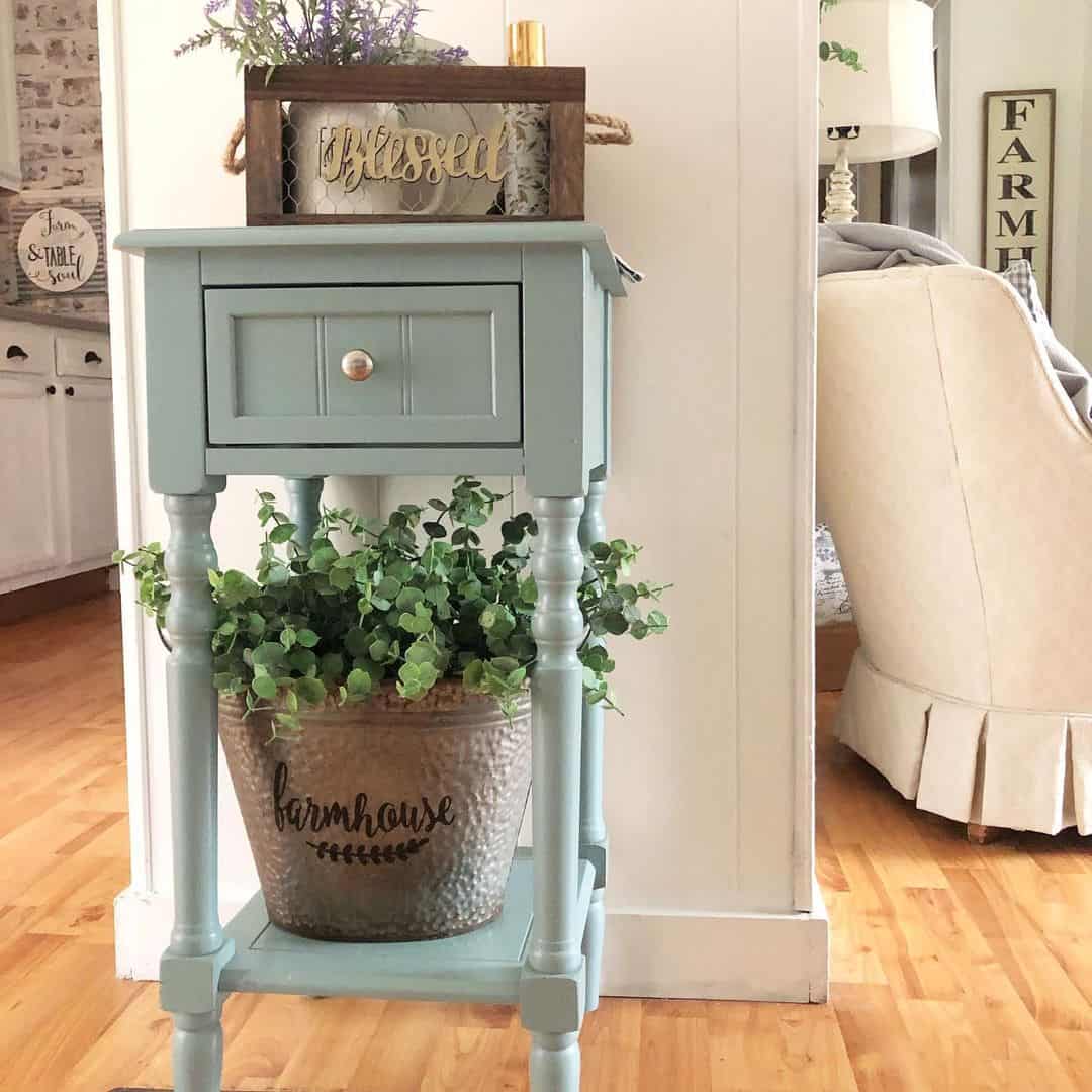 Distressed Side Table Holds a Farmhouse-Embossed Planter
