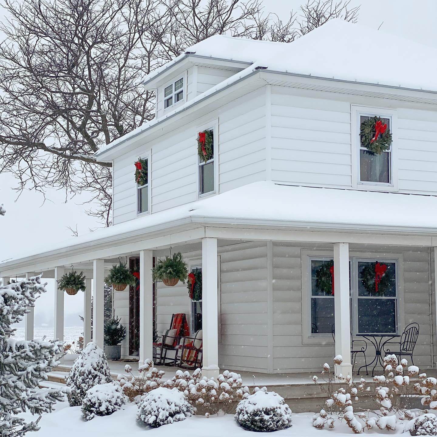 Frame Snowy Views with Wreaths and Red Bows