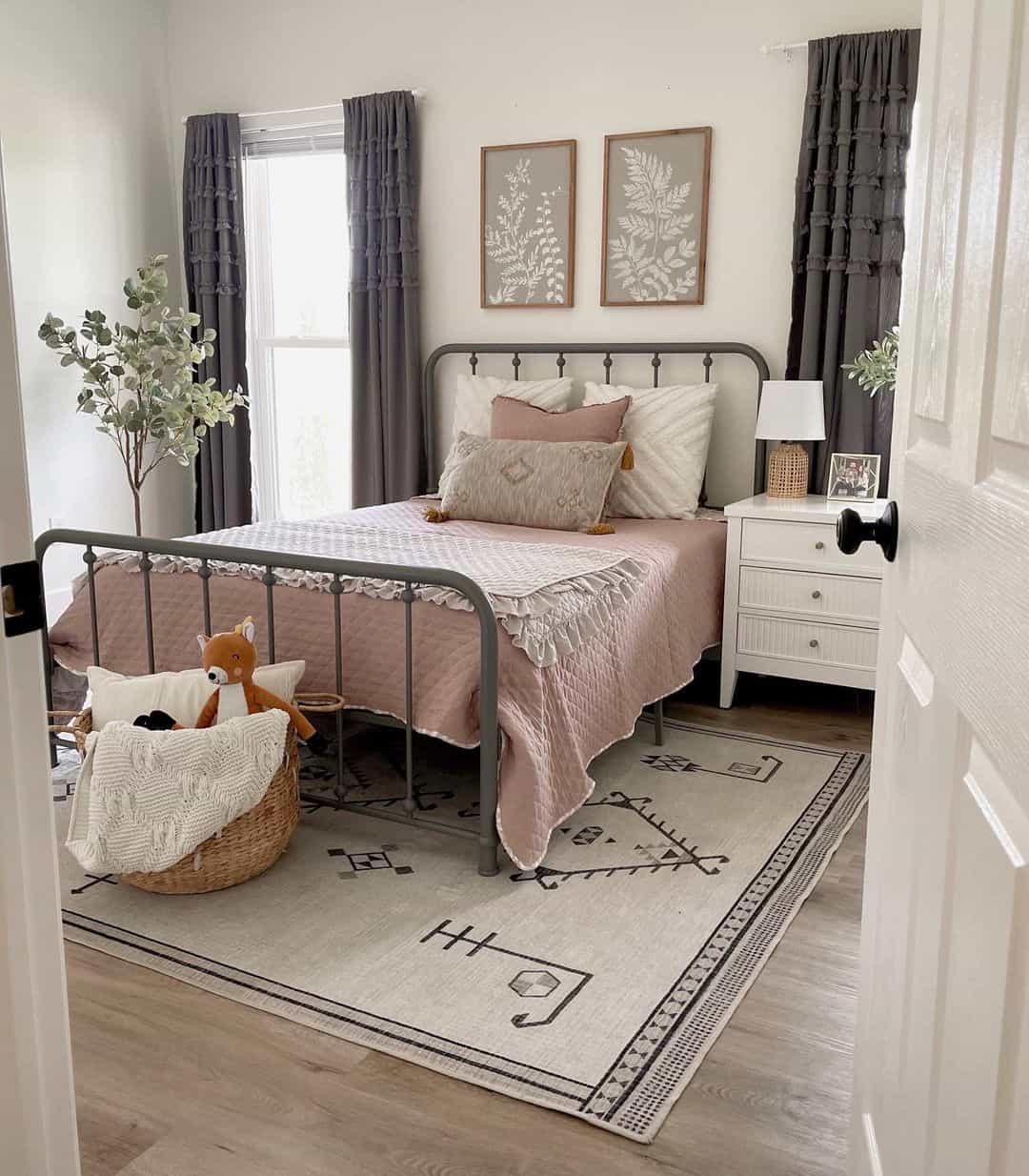 Incorporate Botanical Art Above a Metal Bed