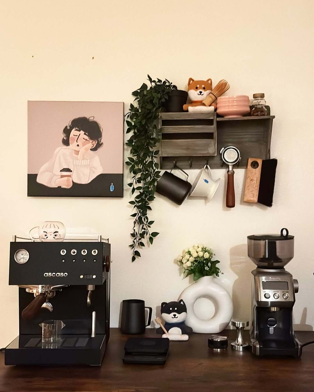 Wall-mounted wooden shelves hold curated coffee bar accessories