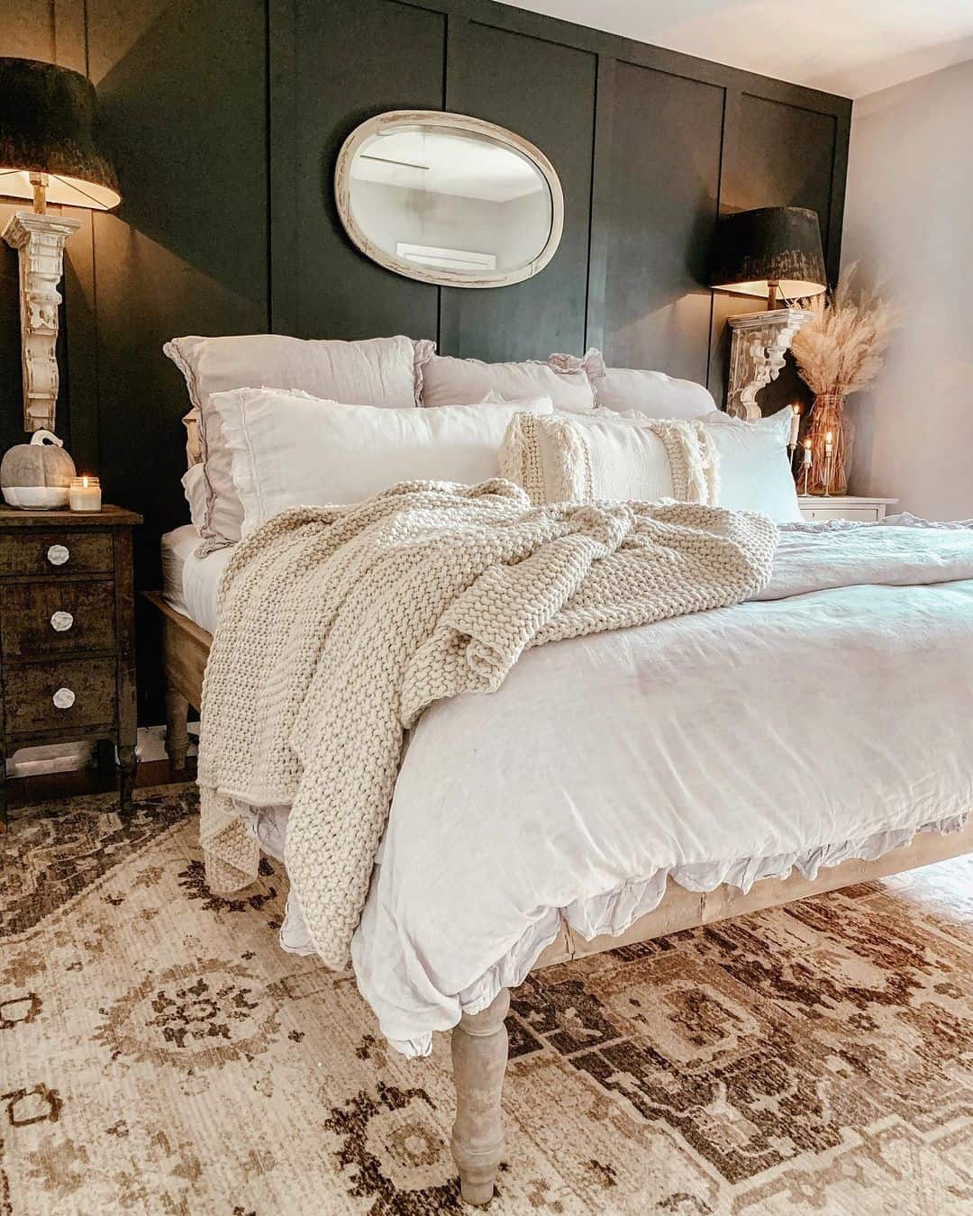 Soften Dark Paneling with an Oval Whitewashed Mirror