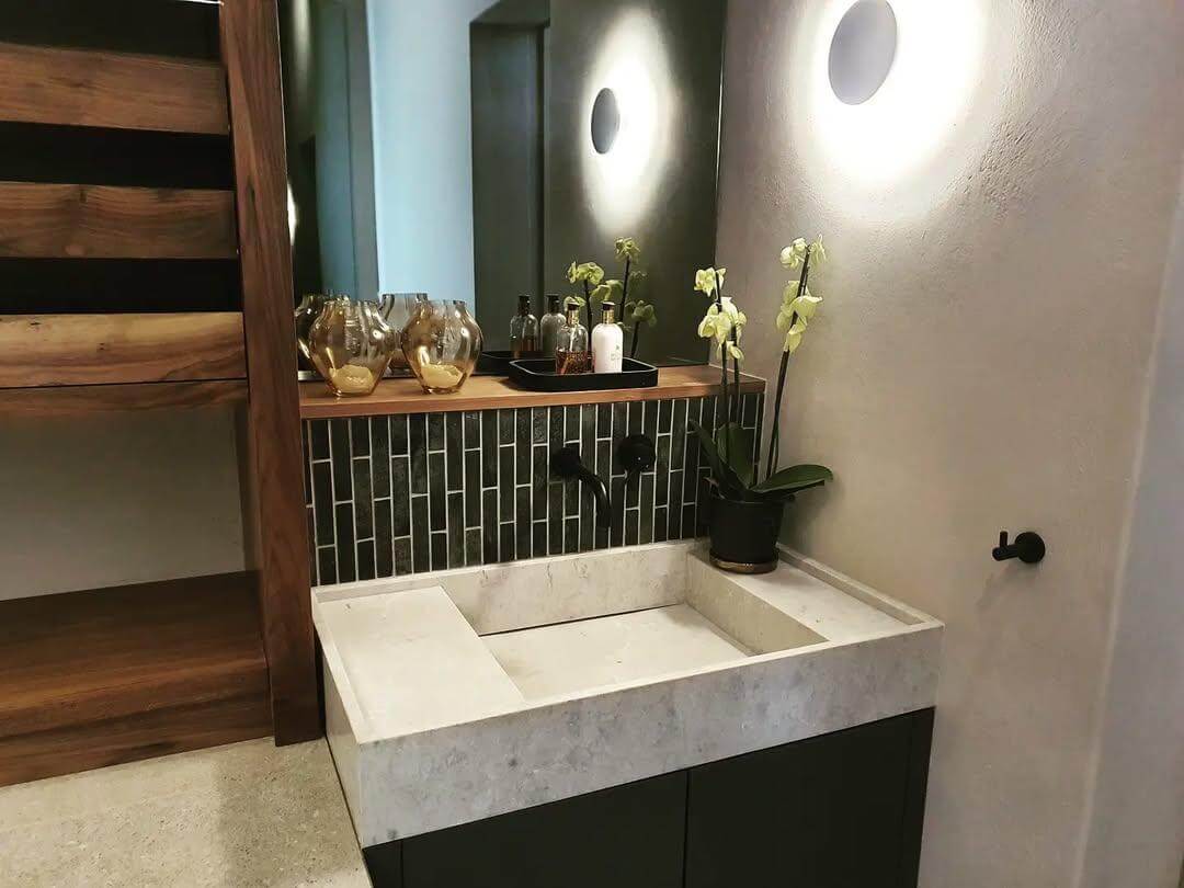 Amber Glass Urns Add Warmth to the Vanity Ledge