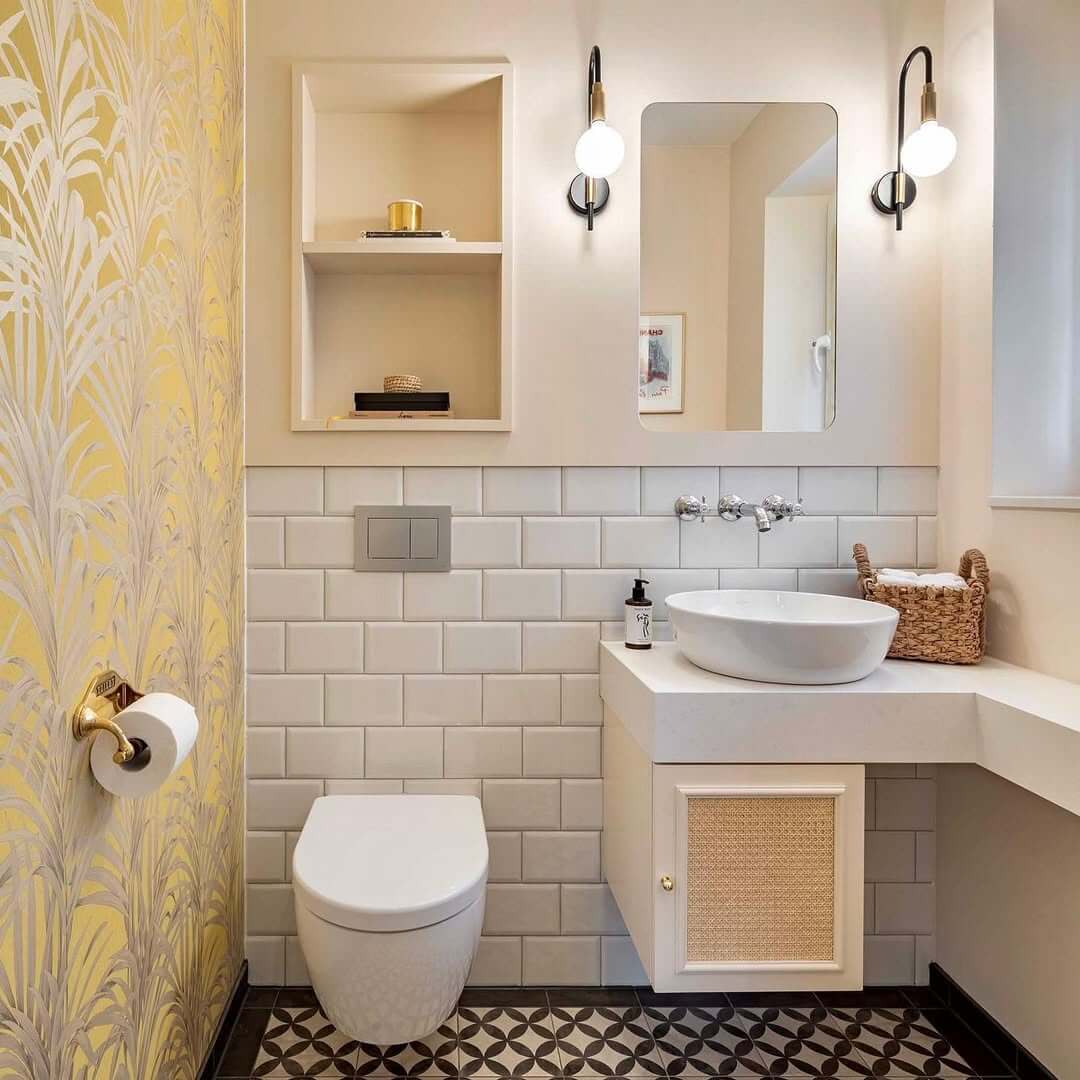 Gold Toilet Paper Holder Complements Bold Wallpaper