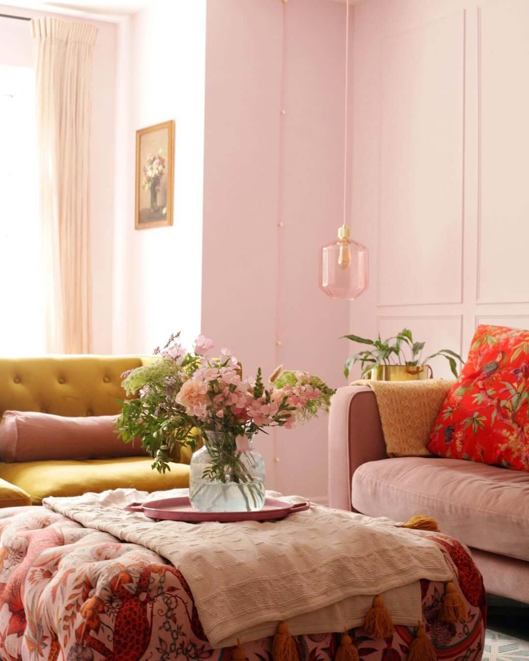 Floral Arrangement Softens Patterned Ottoman