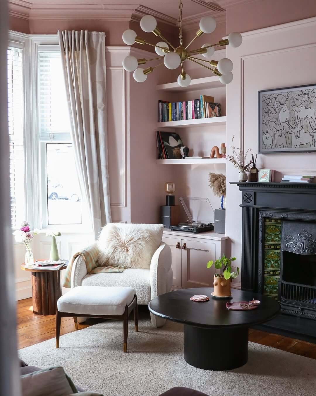 Sculptural Pink Walls Frame Built-In Shelving Unit