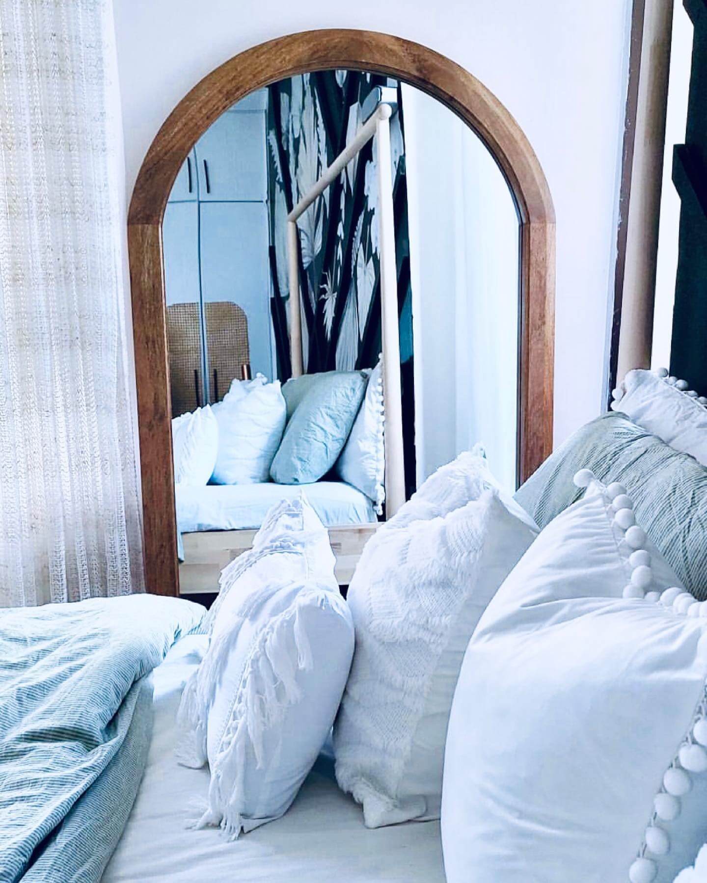 Reflect a Calm Palette with a Natural Wood Arch