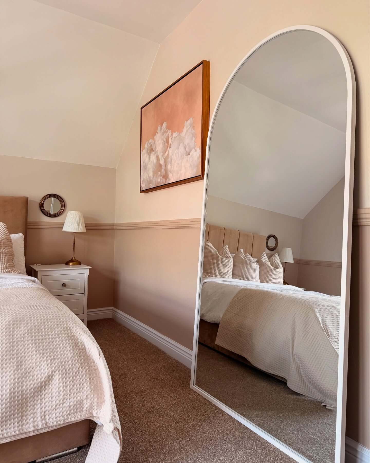 Soften a Modern Space with an Arched White Frame