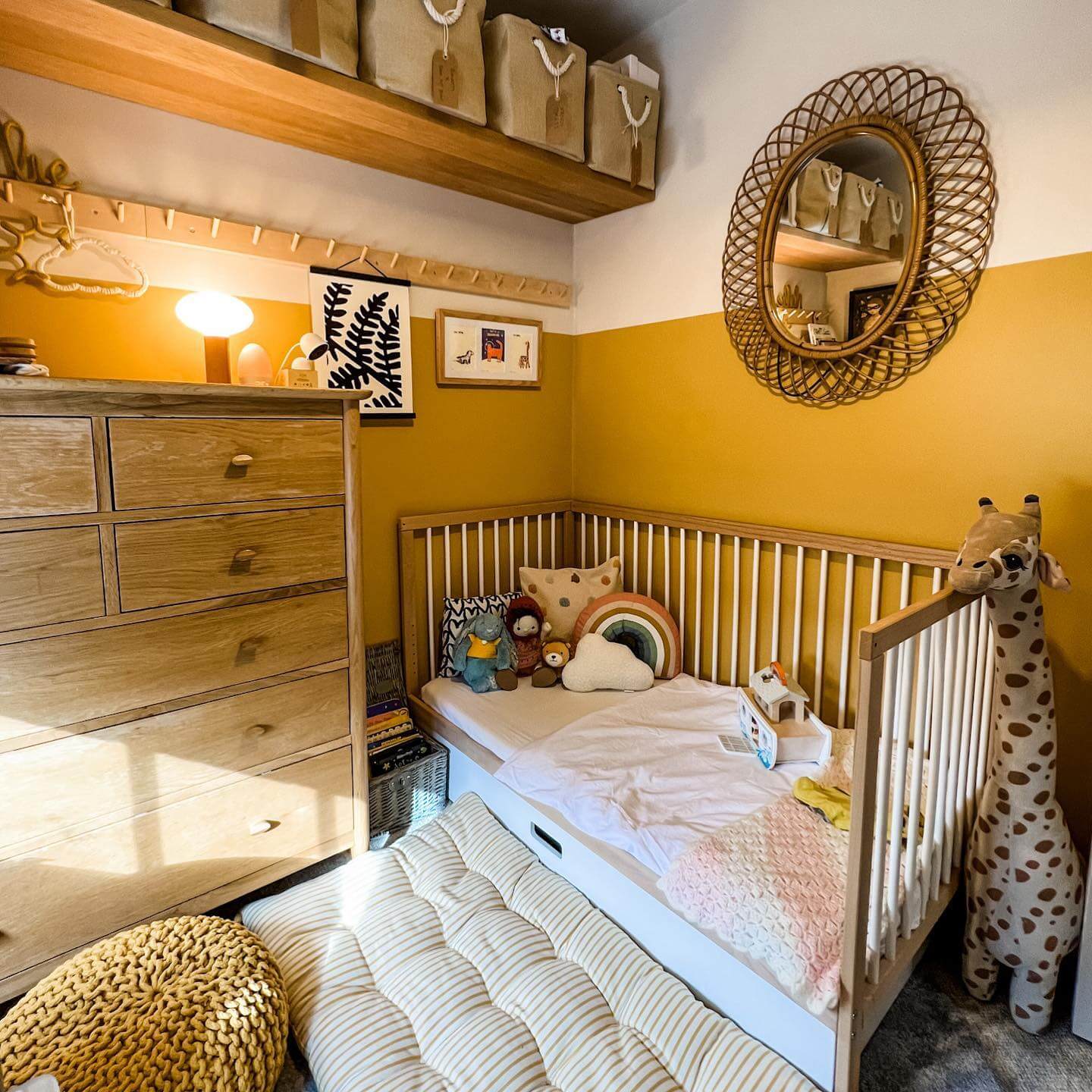 Frame a Two-Tone Wall with an Oval Rattan Mirror