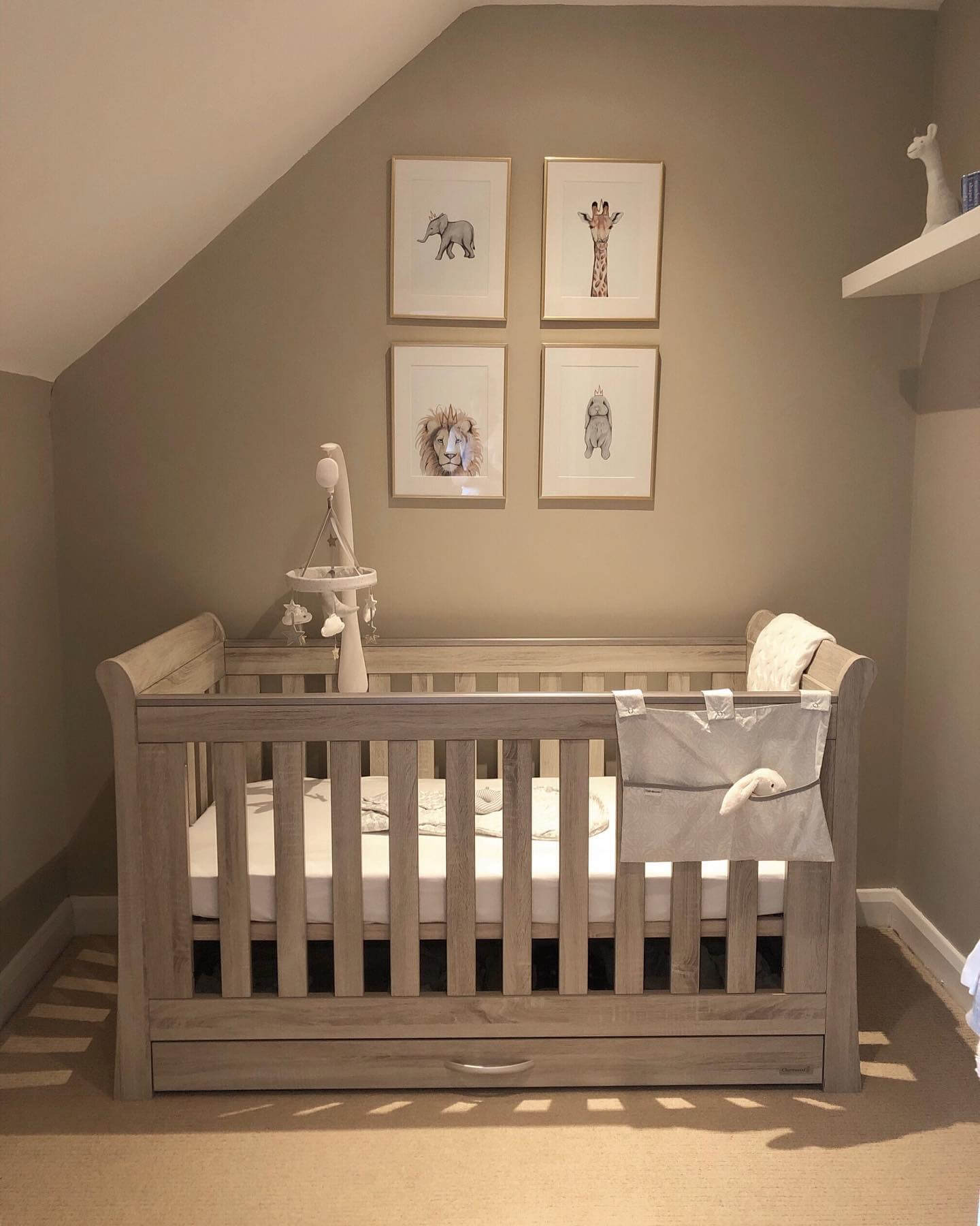 Safari Animal Art Adds Whimsy Above a Neutral Crib