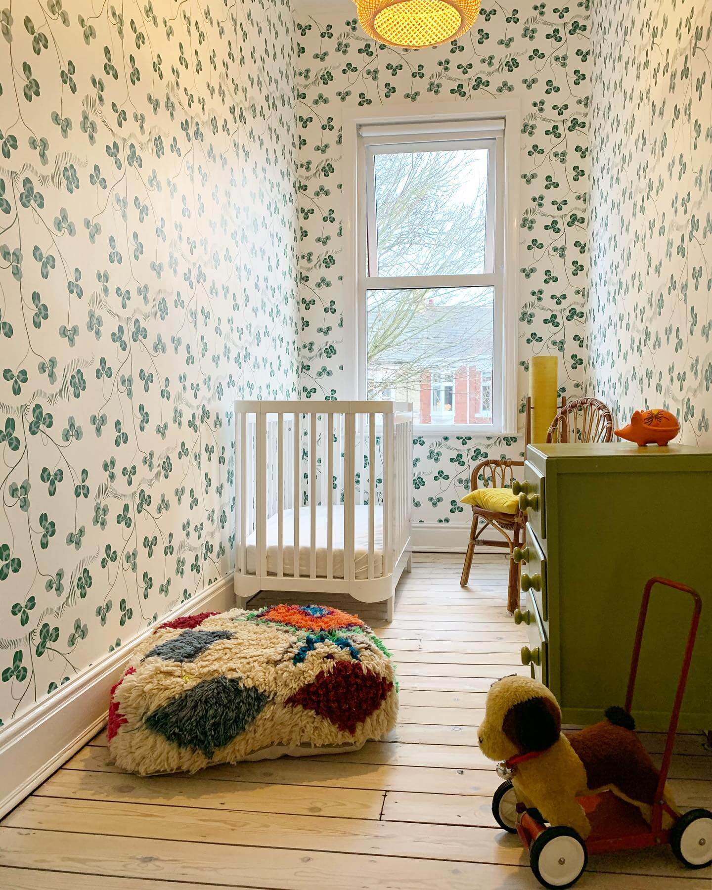 Green Dresser with Yellow Knobs Adds a Playful Storage Accent