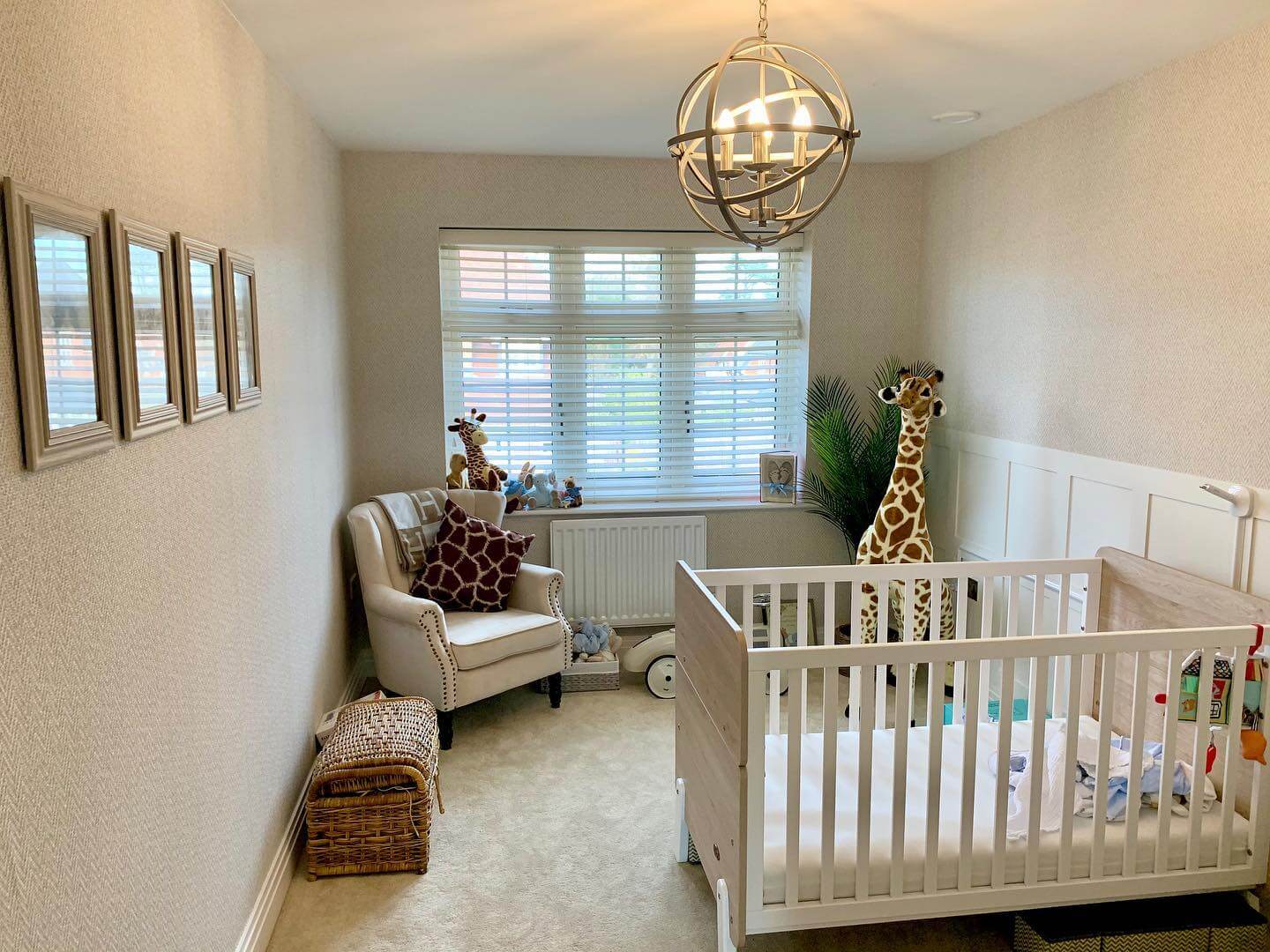 Gallery Wall of Framed Mirrors Adds Depth to Small Nursery
