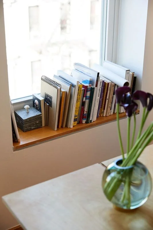 Maximize Space With Books Stacked on a Window Ledge
