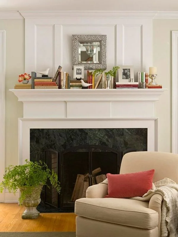 Layer Books With Decorative Objects on Mantel Displays