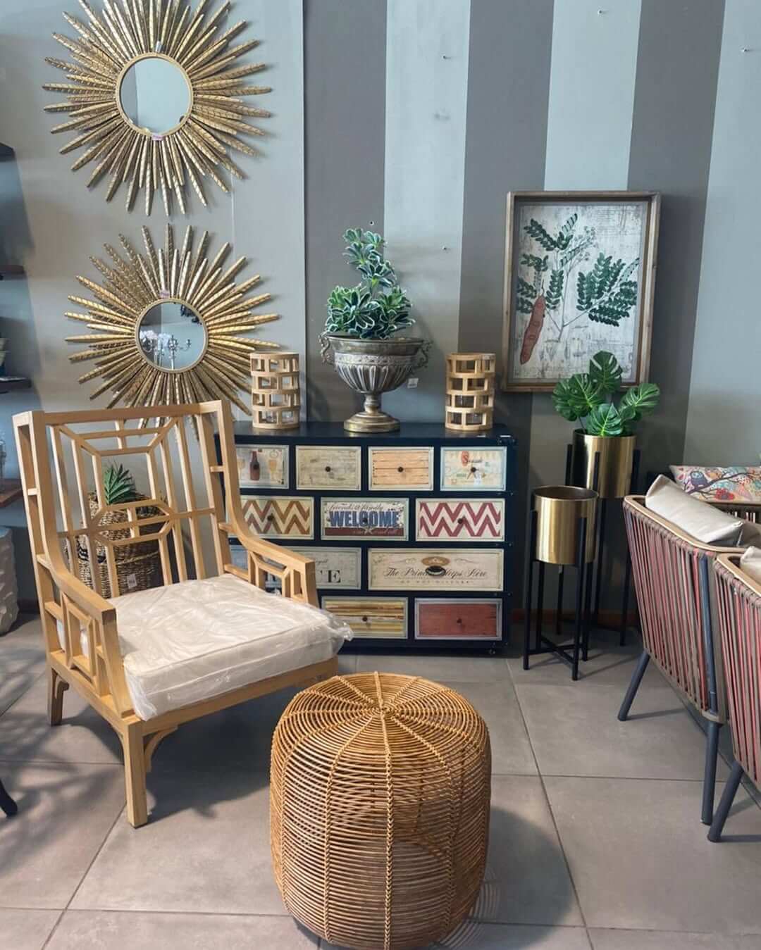 Sunburst Mirrors Add Glamour to a Striped Wall