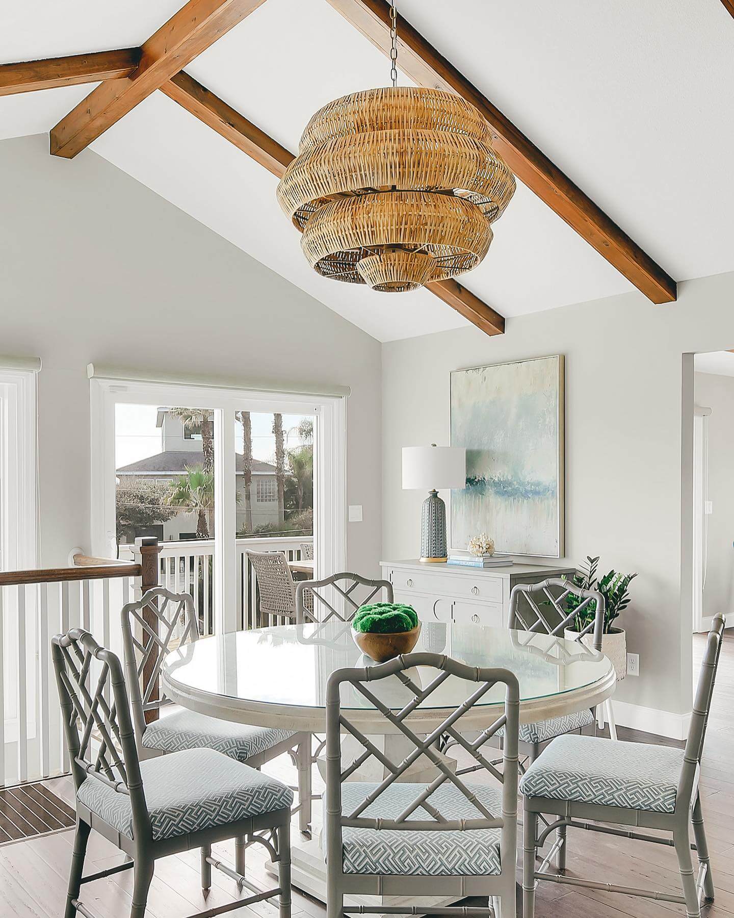 Bamboo-Style Chairs Frame a Glass-Top Table
